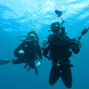 two divers with cameras