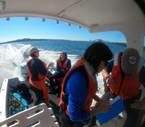Point Defiance Zoo & Aquarium dive team preparing to start kelp survey near Foulweather Bluff.